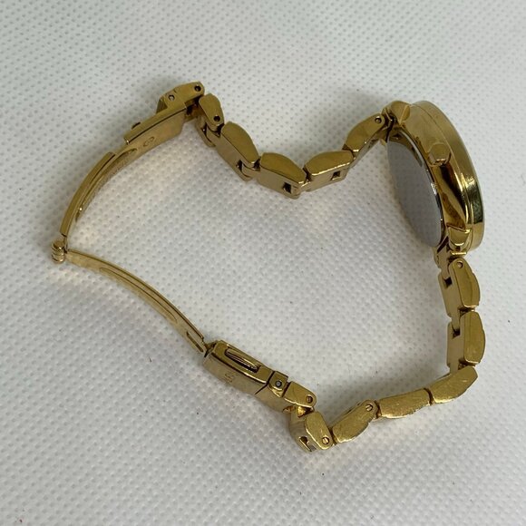 Alba gold tone women date watch 28mm analog fits a small wrist size 5” running - Picture 6 of 7